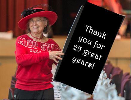 Jo Ann Bradley holding a thank you sign